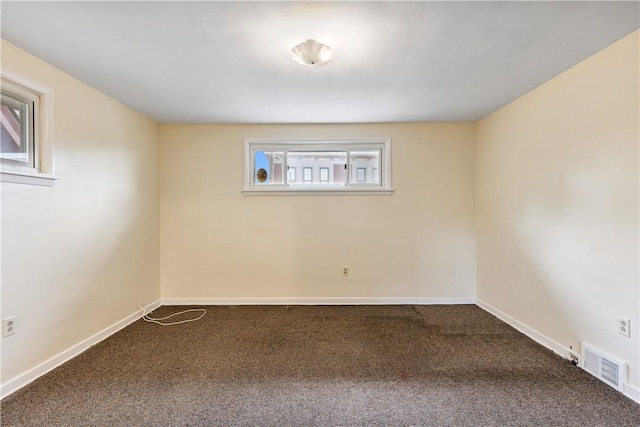 empty room featuring carpet floors