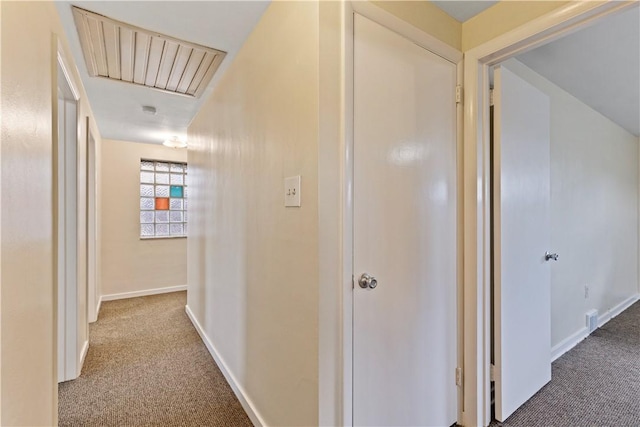 hallway featuring carpet floors