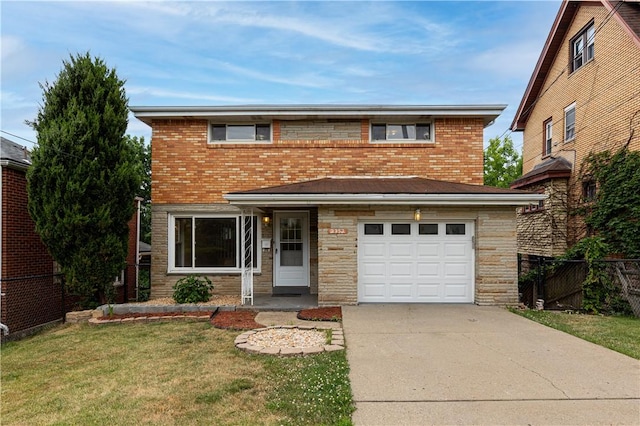 view of front property with a front yard and a garage