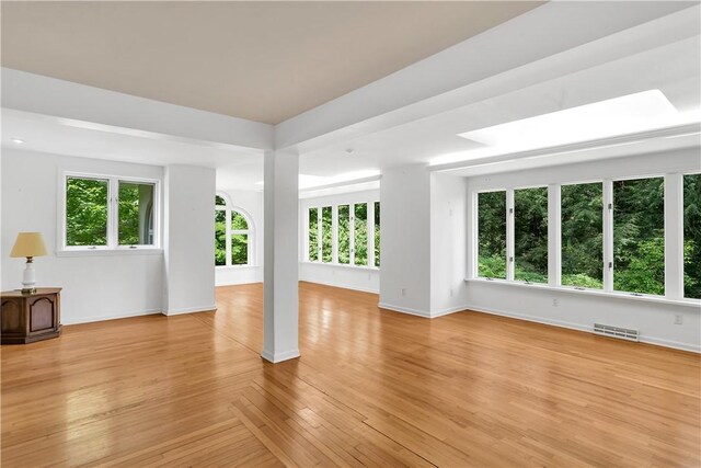 unfurnished room featuring light wood-type flooring