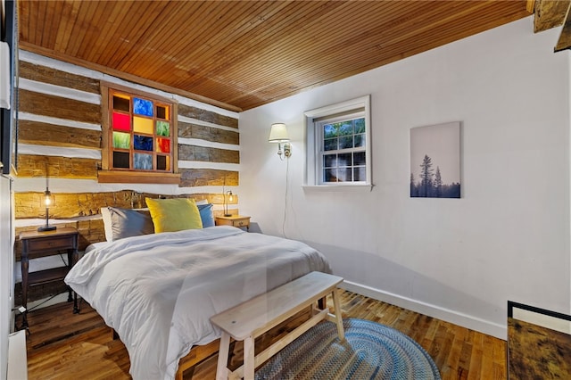 bedroom featuring wood ceiling and wood-type flooring