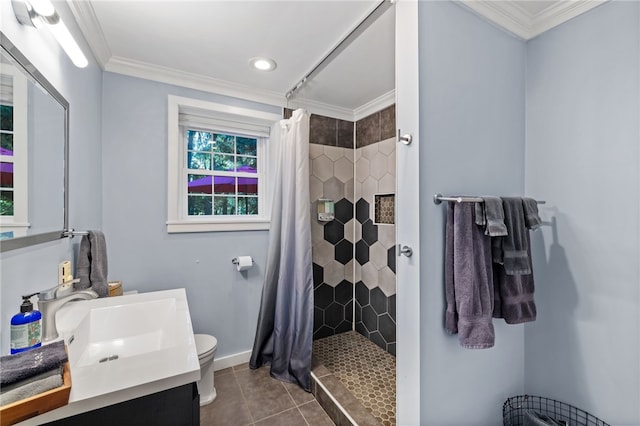 bathroom with tile patterned floors, toilet, a shower with curtain, ornamental molding, and vanity