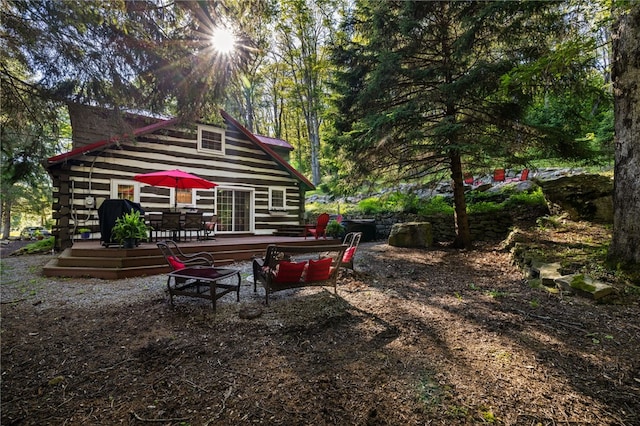 view of yard featuring a wooden deck