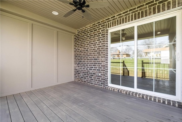 wooden terrace with ceiling fan