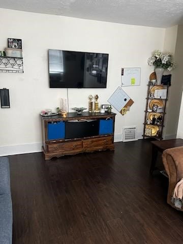 living room featuring dark hardwood / wood-style floors