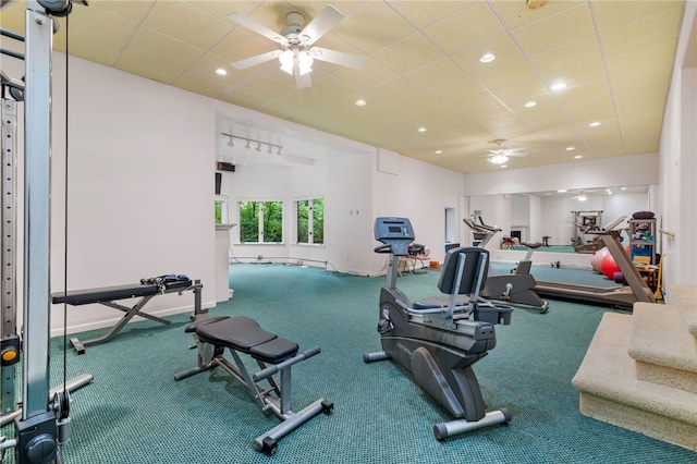 gym featuring carpet floors and ceiling fan