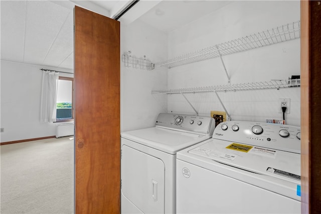 washroom featuring light colored carpet, washing machine and clothes dryer, and hookup for a washing machine