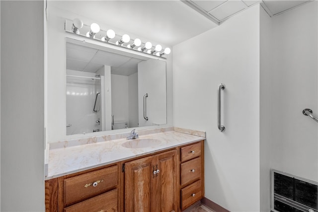 bathroom featuring toilet and vanity