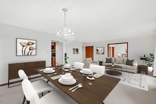 carpeted dining area with an inviting chandelier