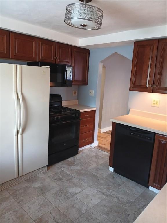 kitchen with black appliances