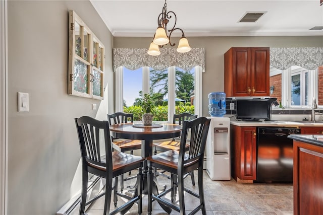 tiled dining space featuring ornamental molding, sink, and a chandelier