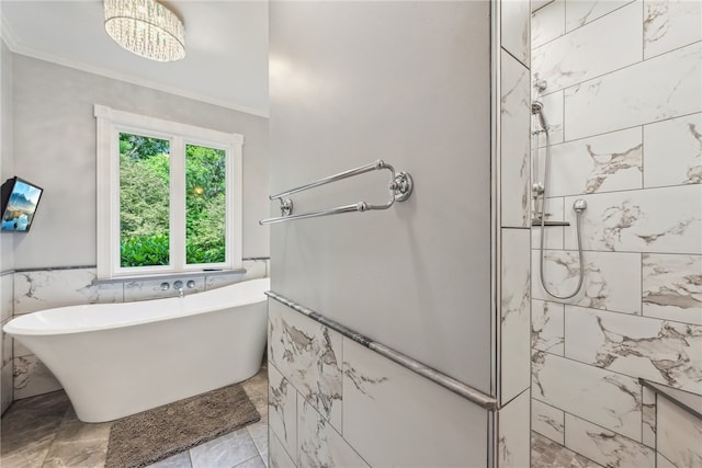 bathroom featuring tile floors, a tile shower, crown molding, and tile walls