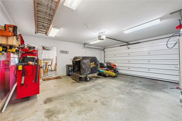 garage featuring a garage door opener