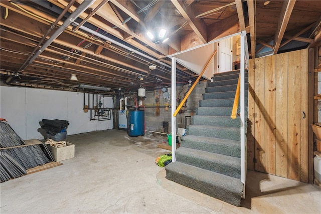 basement featuring electric water heater