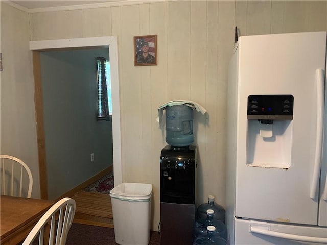 kitchen with white fridge with ice dispenser