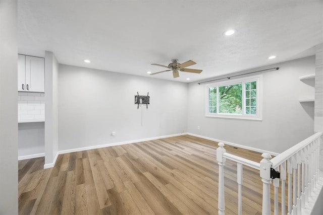 interior space featuring ceiling fan and light hardwood / wood-style flooring