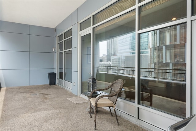 sitting room with carpet floors