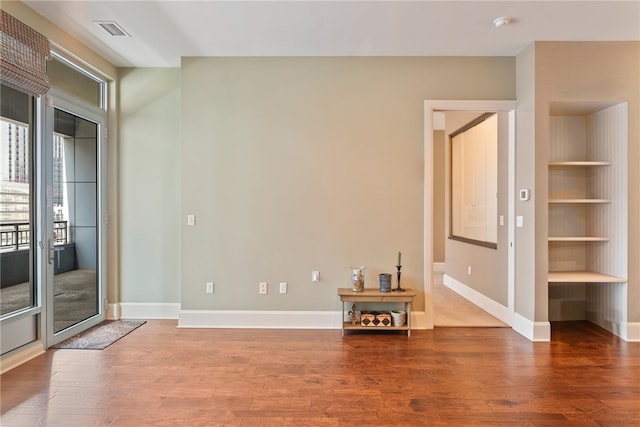 301 5th Ave Unit 603, Downtown Pgh, PA 15222 - unfurnished room featuring wood finished floors and baseboards