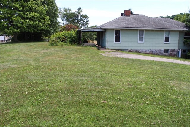 exterior space with a front yard