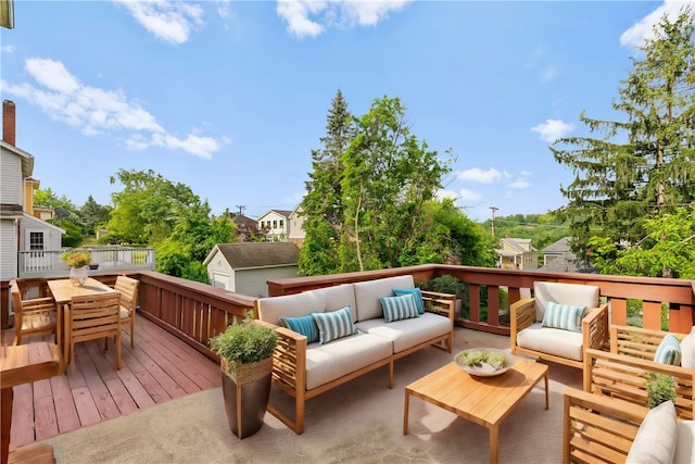 wooden deck featuring outdoor lounge area