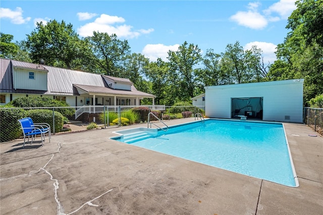 view of pool featuring a patio area