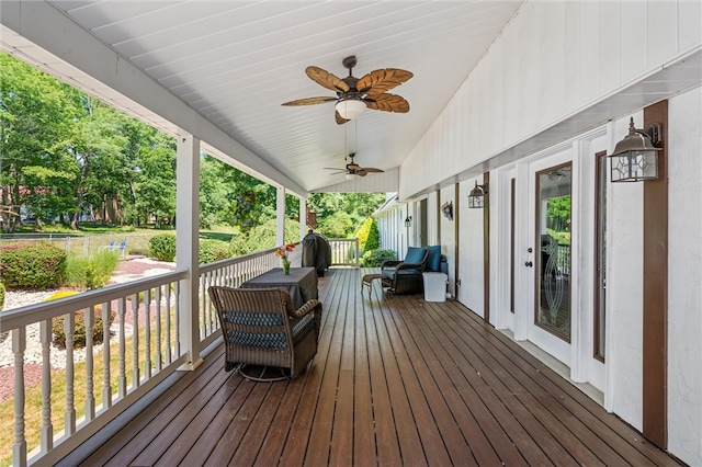 wooden terrace with ceiling fan