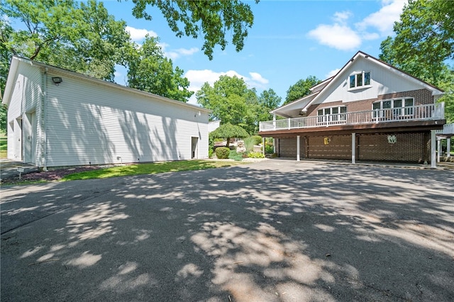 view of side of property with a garage