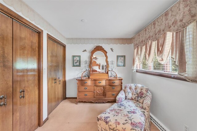 living area with light carpet