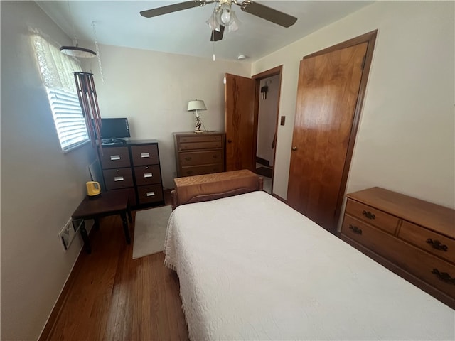 bedroom featuring ceiling fan and hardwood / wood-style floors