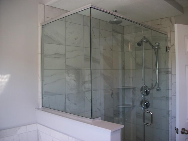 bathroom with an enclosed shower