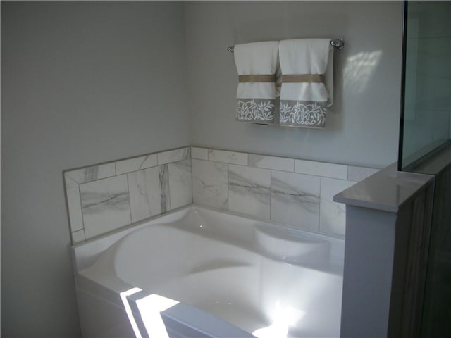 bathroom with a tub