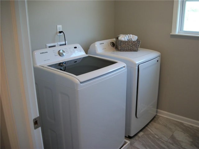 laundry area featuring separate washer and dryer