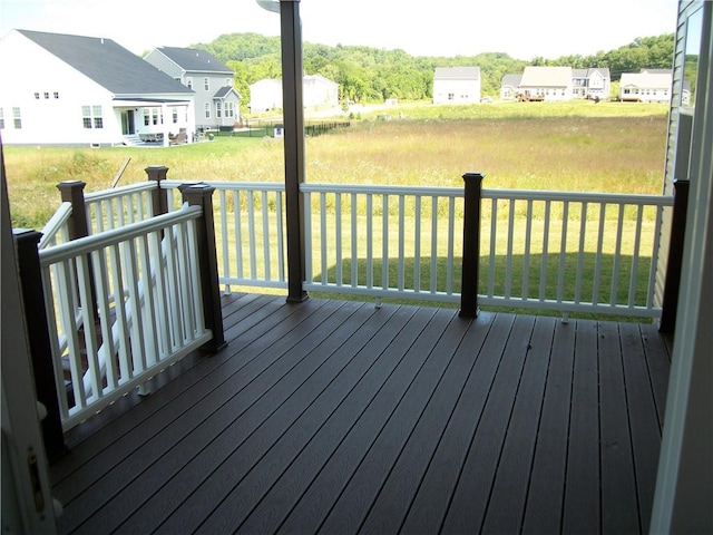 deck featuring a lawn