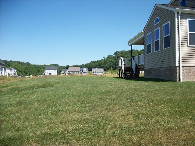 view of yard with a deck