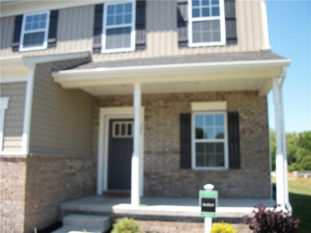 property entrance with a porch