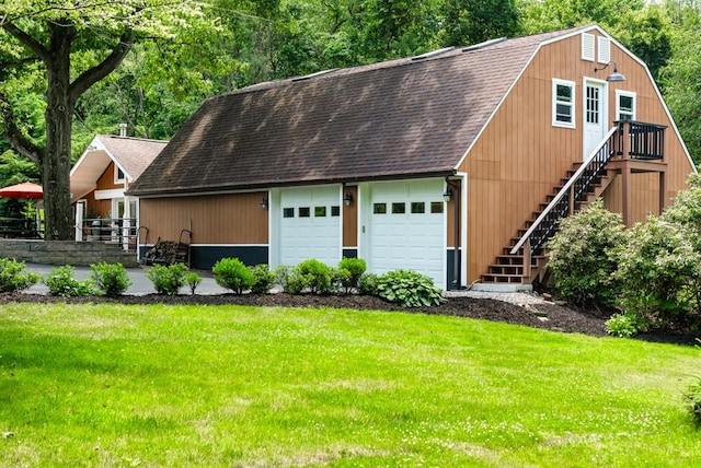 garage with a yard