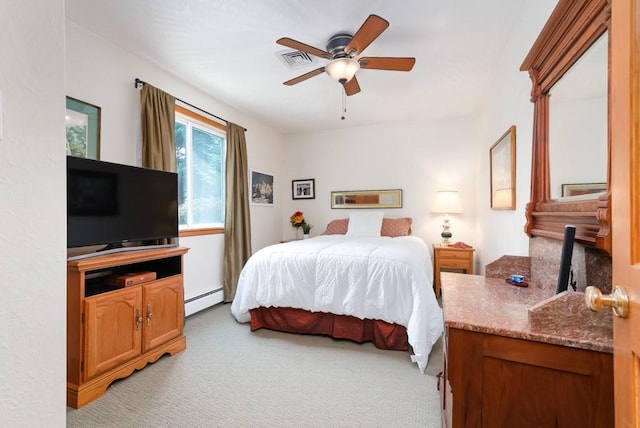 bedroom with ceiling fan, a baseboard radiator, and light carpet