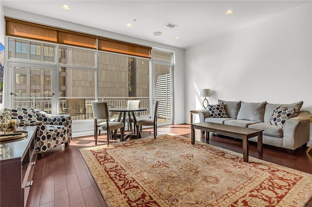 living room with dark wood-type flooring