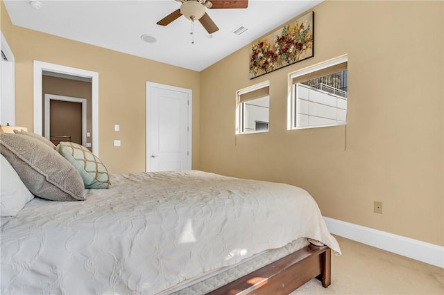 bedroom with ceiling fan and carpet flooring