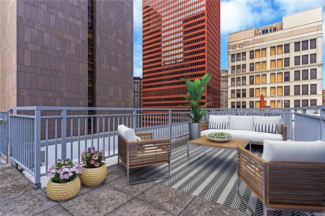 view of patio / terrace with an outdoor living space and a balcony