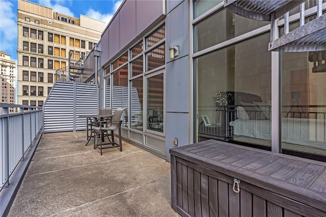 view of patio / terrace featuring a balcony