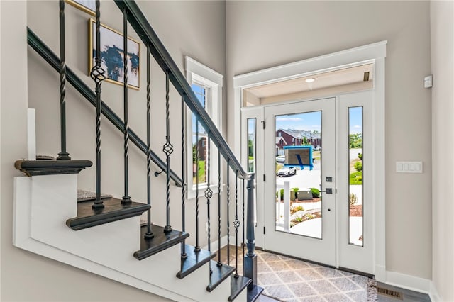 foyer featuring plenty of natural light