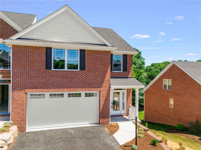 view of front of house with a garage