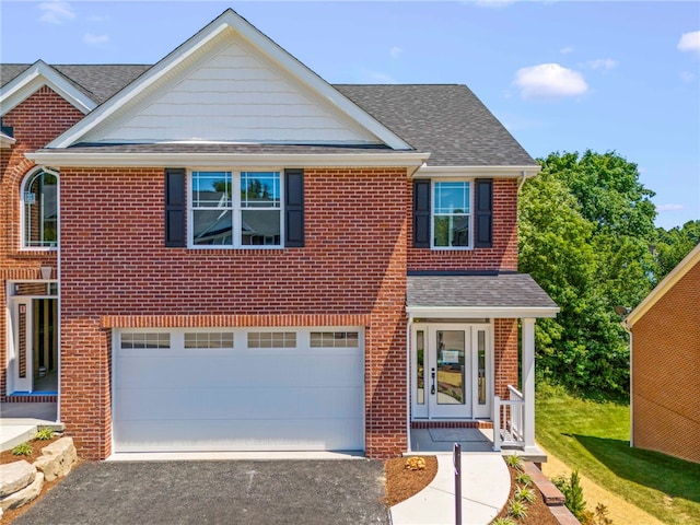 view of front of home with a garage