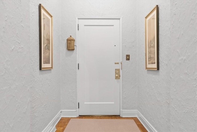 entryway featuring hardwood / wood-style flooring