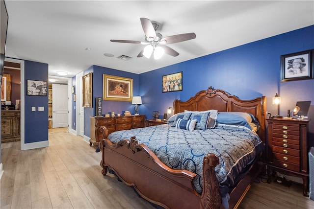 bedroom featuring wood-type flooring and ceiling fan