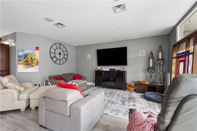 living room with hardwood / wood-style flooring