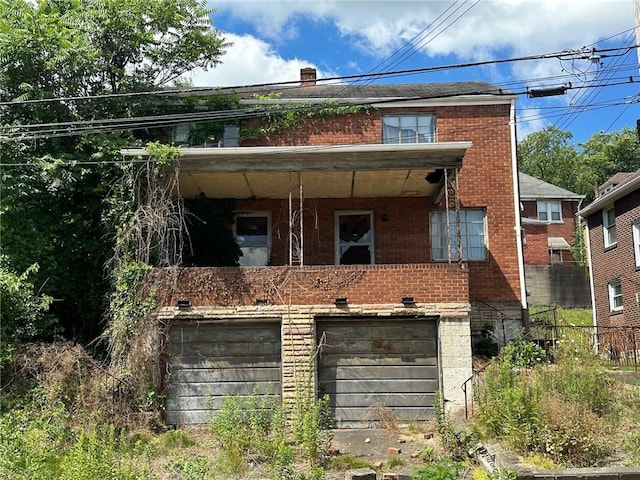 exterior space with a garage