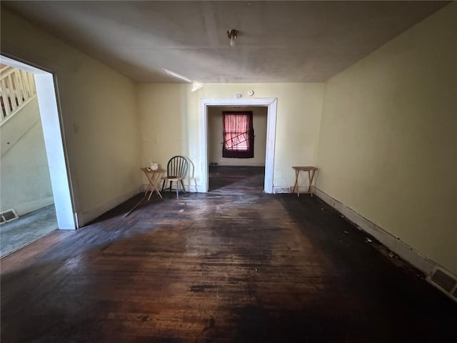 interior space with dark hardwood / wood-style flooring