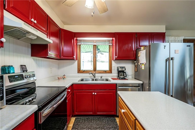 kitchen featuring ceiling fan, sink, and appliances with stainless steel finishes